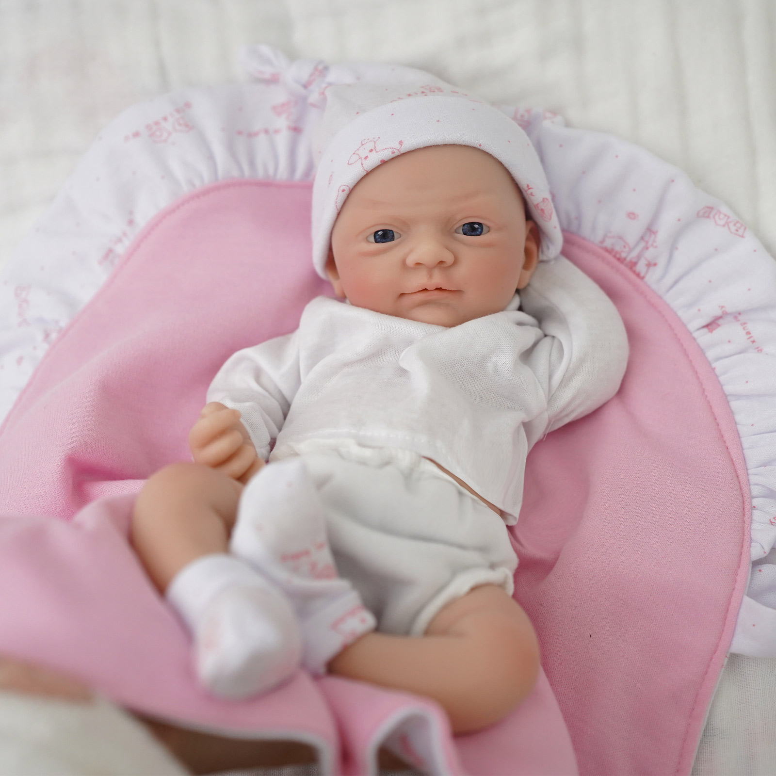 Muñeca bebé de silicona de cue - Kids Educational Songs reseña y precio